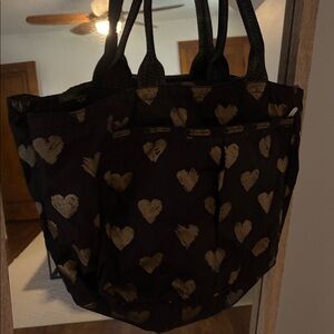 LeSportSac black nylon bag with gold heart